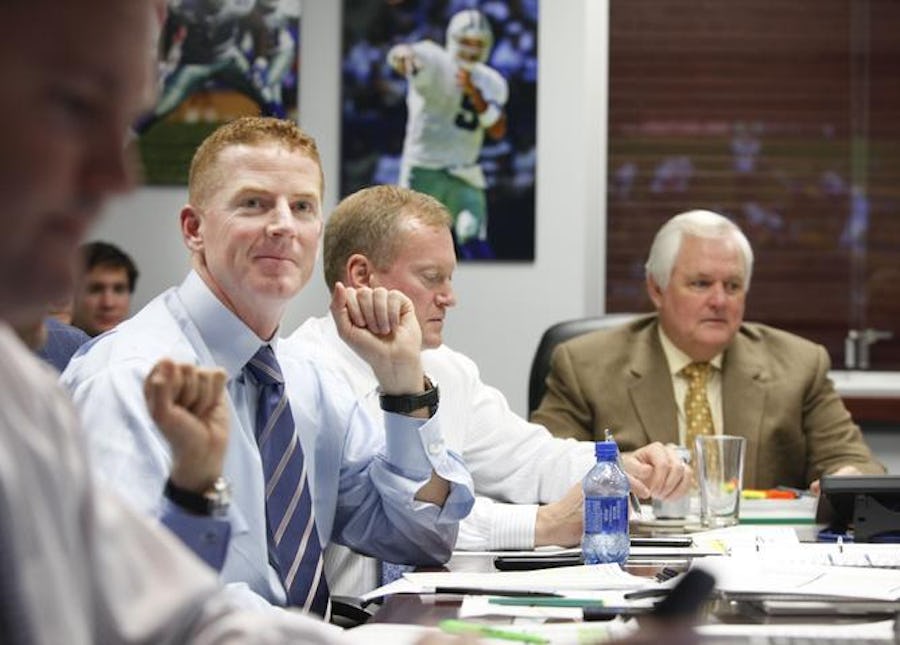 Dallas Cowboys offensive coordinator Jason Garrett, Jerry Jones Jr., Chief Sales & Marketing Officer, and Dallas Cowboys coach Wade Phillips in the war room during the first round of the NFL Draft at Valley Ranch.