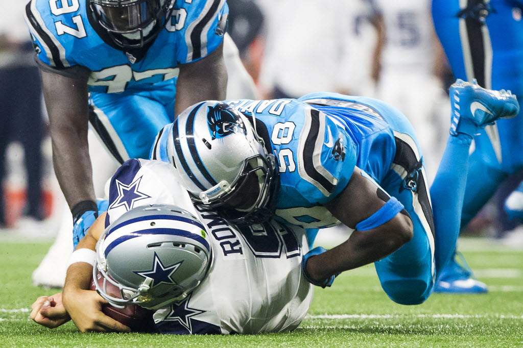 Carolina Panthers defensive end Mario Addison, left, and defensive