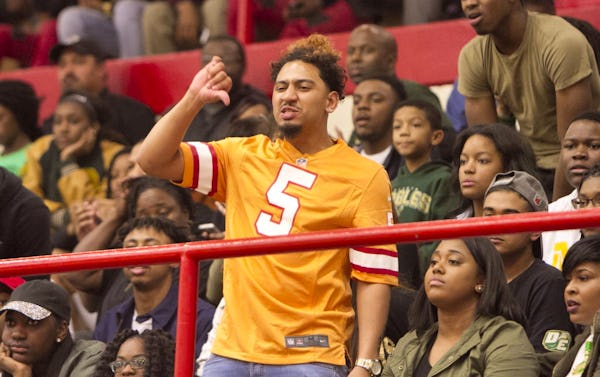 A group of DeSoto Eagles fans react to a referee's call during first half action against Cedar Hill. The two teams played their District 8-6A basketball game at Cedar Hill High School on January 15, 2016. (Steve Hamm/Special Contributor)