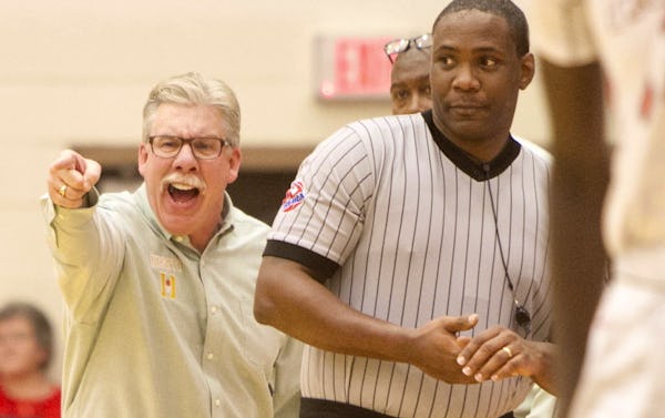 DeSoto head coach Chris Dyer vehemently makes a point during a brief break in the action of the opening period of play against Cedar Hill. The two teams played their District 8-6A basketball game at Cedar Hill High School on January 15, 2016. (Steve Hamm/Special Contributor)