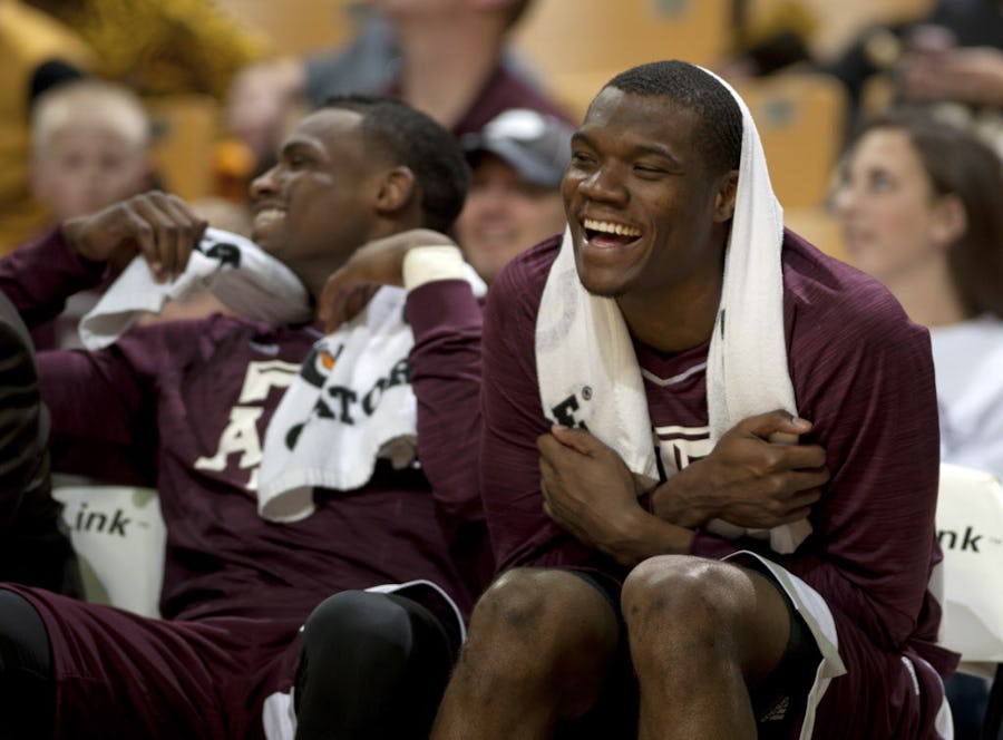 Texas A&M's Jalen Jones, right, laughs while on the bench during the second half of an NCAA college basketball game against Missouri Saturday, Feb. 27, 2016, in Columbia, Mo. Texas A&M won 84-69. (Nick Schnelle/Columbia Daily Tribune via AP)