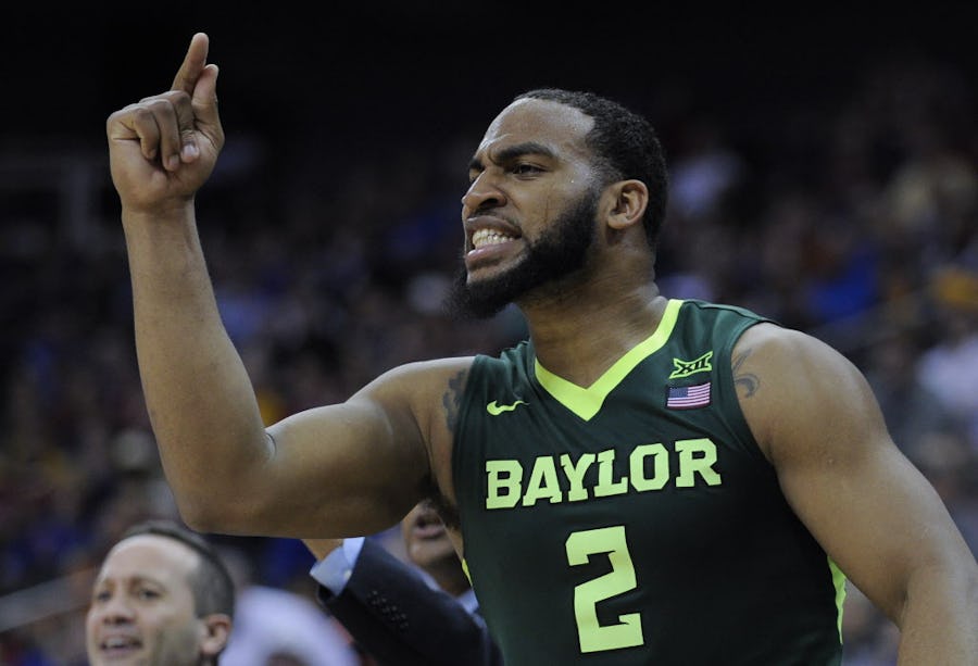 KANSAS CITY, MO - MARCH 10:  Rico Gathers #2 of the Baylor Bears cheers on his team during a game against the Texas Longhorns in the second half during the quarterfinals of the Big 12 Basketball Tournament at Sprint Center on March 10, 2016 in Kansas City, Missouri. Baylor won 75-61. (Photo by Ed Zurga/Getty Images)