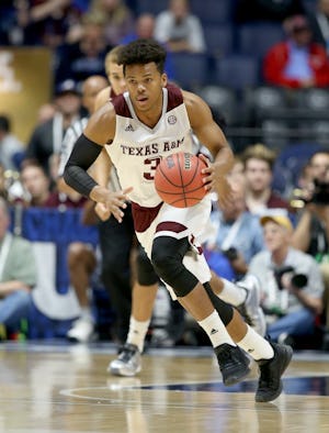 NASHVILLE, TN - MARCH 11:  Admon Gilder #3 of the Texas A&M Aggies dribbles the ball in the game against the Florida Gators during the quarterfinals of the SEC Basketball Tournament at Bridgestone Arena on March 11, 2016 in Nashville, Tennessee.  (Photo by Andy Lyons/Getty Images)