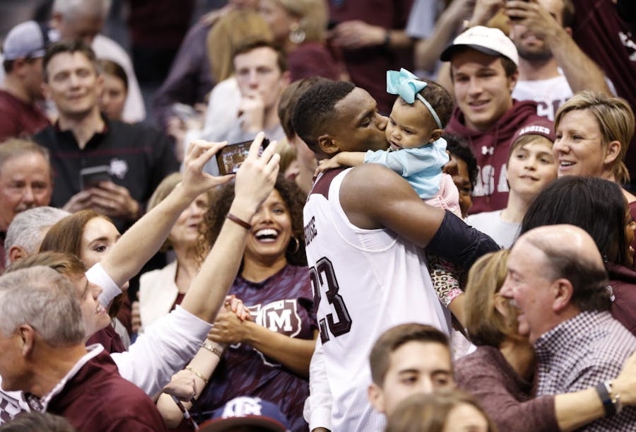 Texas A&M Aggies guard Danuel House (23) kisses his daughter Ava Kennedy House after defeating the Northern Iowa Panthers in the second round of the 2016 NCAA Division I Men's Basketball Championship at Chesapeake Energy Arena in Oklahoma City on Sunday, March 20, 2016. Texas A&M Aggies defeated Northern Iowa Panthers 92-88 in double overtime.