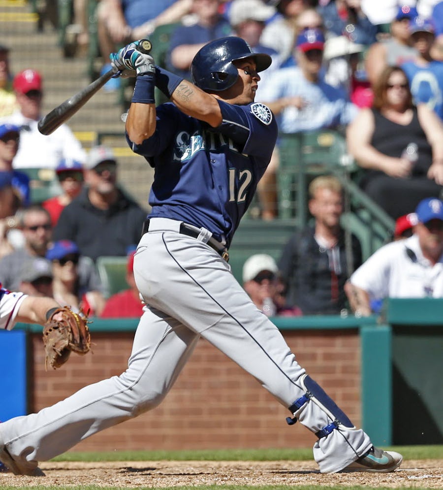 Seattle Mariners center fielder Leonys Martin (12) watches his RBI double against Texas Rangers in the 9th inning at Globe Life Park in Arlington, Texas, Wednesday, April 6, 2016. Texas Rangers lost 9-5. (Jae S. Lee/The Dallas Morning News)