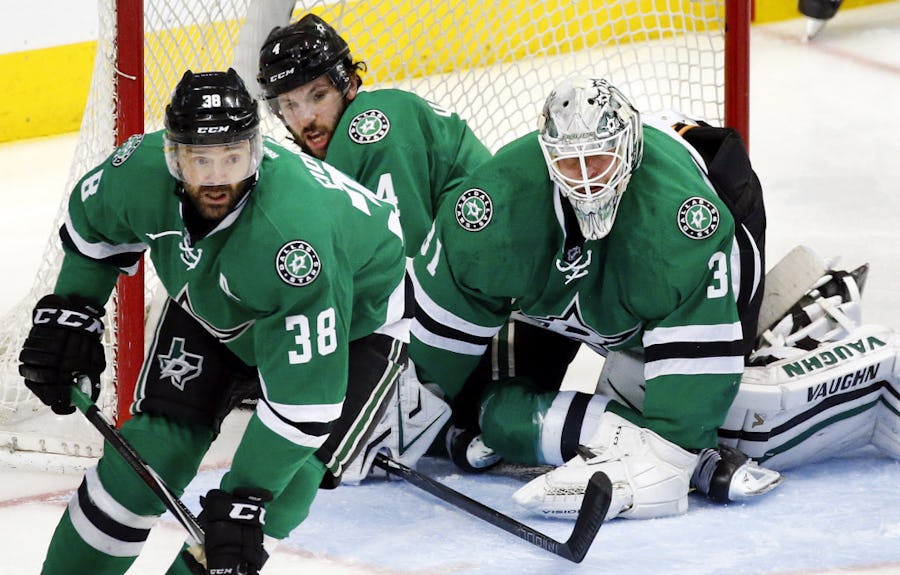 Dallas Stars defenseman Jason Demers (4) ends up in the goal trying to help goalie Antti Niemi (31) during overtime against the St. Louis Blues in Game 2 of the NHL Western Conference Semifinals at the American Airlines Center in Dallas, Sunday, May 1, 2016. The Stars lost, 4-3. (Tom Fox/The Dallas Morning News)