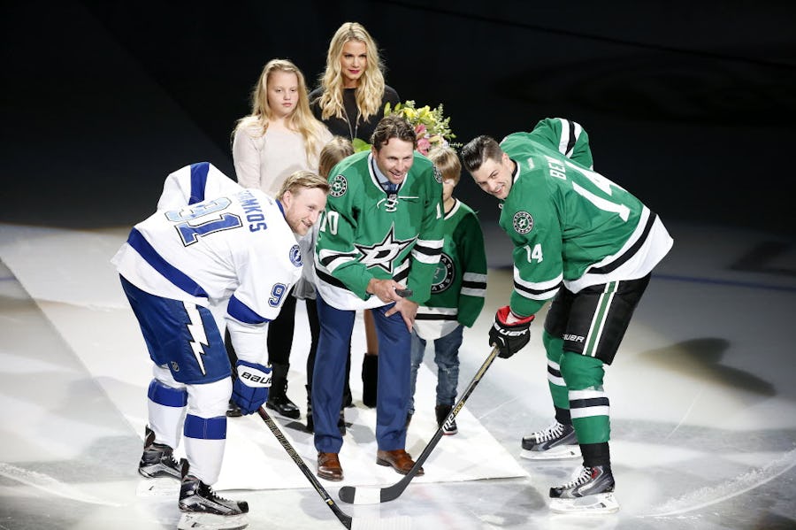 Former Dallas Stars player Brenden Morrow, center, drops the puck in a retirement ceremony between Dallas Stars left wing Jamie Benn (14) and Tampa Bay Lightning center Steven Stamkos (91) at American Airlines Center in Dallas, Thursday, March 17, 2016. (Jae S. Lee/The Dallas Morning News)