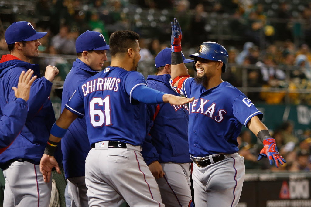 Rougned Odor of the Texas Rangers celebrates after hitting a run