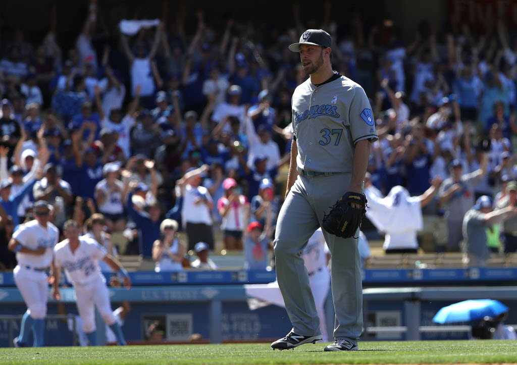 Tyler Thornburg of the Cincinnati Reds throws a pitch during the News  Photo - Getty Images