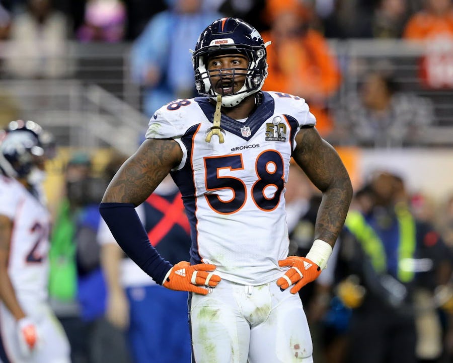 FILE - In this Feb. 7, 2016, file photo, Denver Broncos' Von Miller pauses during NFL football's Super Bowl 50 against the Carolina Panthers in Santa Clara, Calif. Miller, Miami Heat's Dwyane Wade and Chicago Cubs' Jake Arrieta will be featured in ESPN The Magazine's eighth annual Body Issue. (AP Photo/Gregory Payan, File)