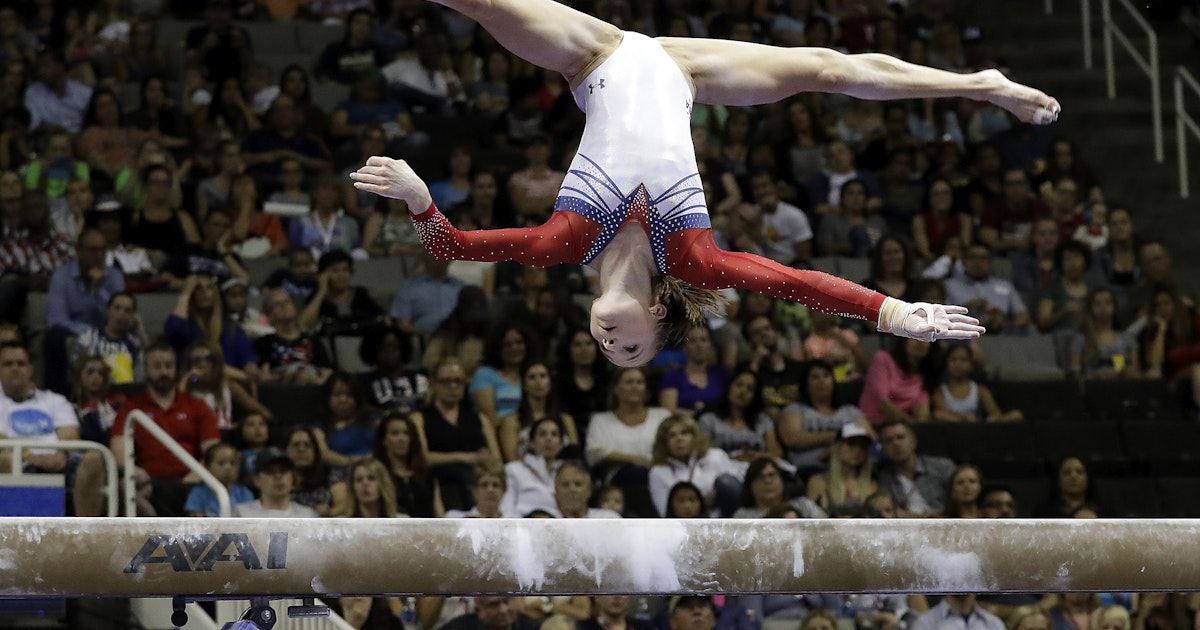 Uneven bars female gymnast editorial image. Image of 