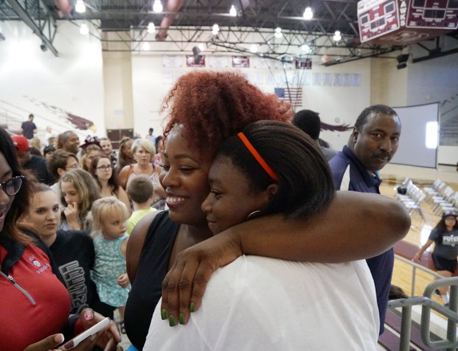 Michelle Carter hugs Darielle Haynes during a send off for Michelle at Red Oak High School in Red Oak, Texas on Tuesday, July 19, 2019. Carter, a Red Oak graduate and national shot put record holder will be competing in her third Oympics. (Lawrence Jenkins/Special Contributor)