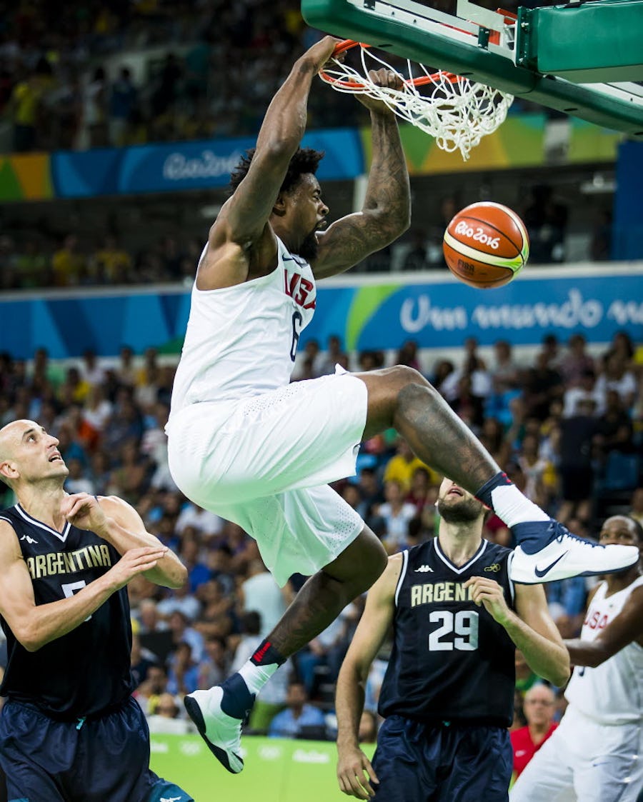 DeAndre Jordan of United States dunks the ball past Manu Ginobili (5) u00a0and Patricio Garino (29) of Argentina during a men's basketball quarterfinal at the Rio 2016 Olympic Games on Wednesday, Aug. 17, 2016, in Rio de Janeiro. (Smiley N. Pool/The Dallas Morning News)