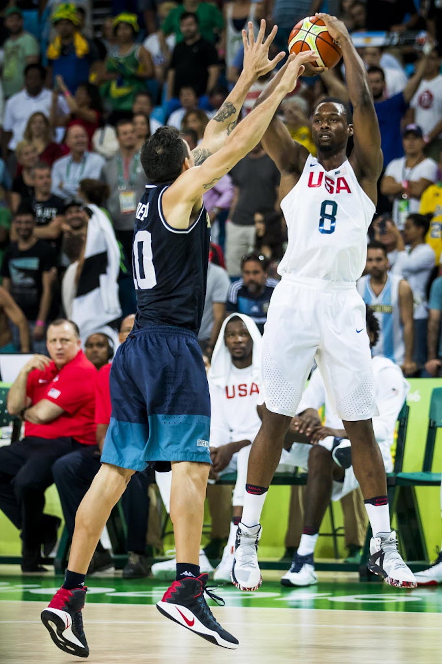 Harrison Barnes (8) of United States shoots over Carlos Delfino (10) of Argentina during a men's basketball quarterfinal at the Rio 2016 Olympic Games on Wednesday, Aug. 17, 2016, in Rio de Janeiro. (Smiley N. Pool/The Dallas Morning News)