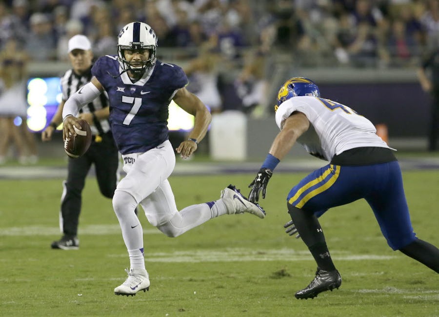 TCU quarterback Kenny Hill (7) runs against South Dakota State defensive back Nick Mears (42) on the keeper during the first half of an NCAA college football game Saturday, Sept. 3, 2016, in Fort Worth, Texas. (AP Photo/LM Otero)