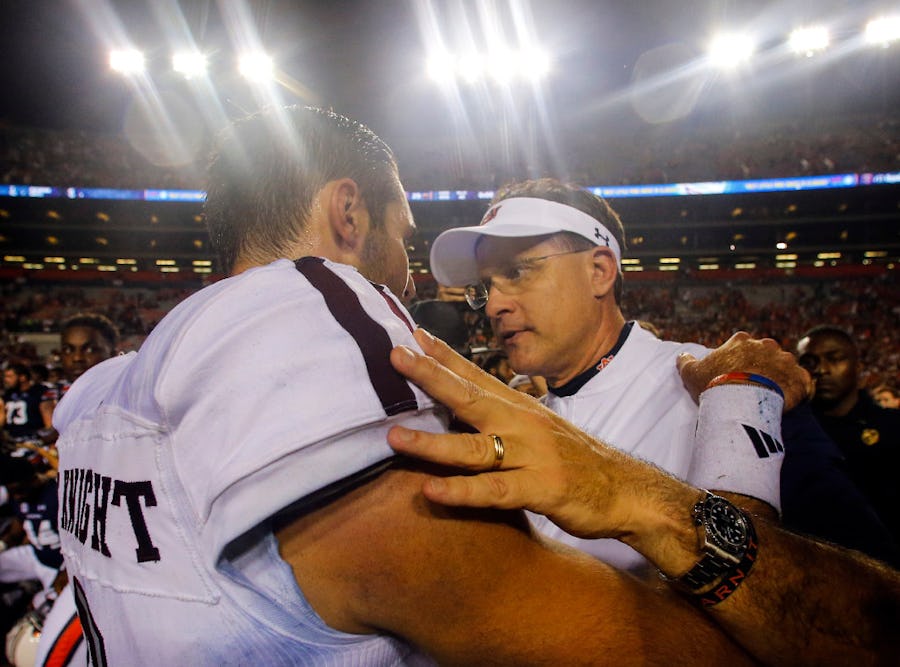 AUBURN, AL - SEPTEMBER 17:  Quarterback Trevor Knight #8 of the Texas A&M Aggies (left) talks with Head Coach Gus Malzahn of the Auburn Tigers at the end of an NCAA college football game on September 17, 2016 in Auburn, Alabama. Texas A&M Aggies won 29-16 (Photo by Butch Dill/Getty Images)