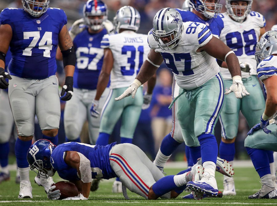 Dallas Cowboys defensive tackle Terrell McClain (97) gestures after stopping New York Giants running back Rashad Jennings (23) for a loss on Sunday, Sept. 11, 2016 at AT&T Stadium, in Arlington, Texas. (Richard W. Rodriguez/Fort Worth Star-Telegram/TNS)