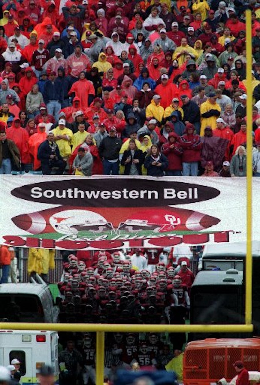 ORG XMIT: S0369757380_STAFF 10-7-00.. Univeristy of Oklahoma football players gather in the tunnel  before running onto the field at the Cotton Bowl for the Red River Shootout.