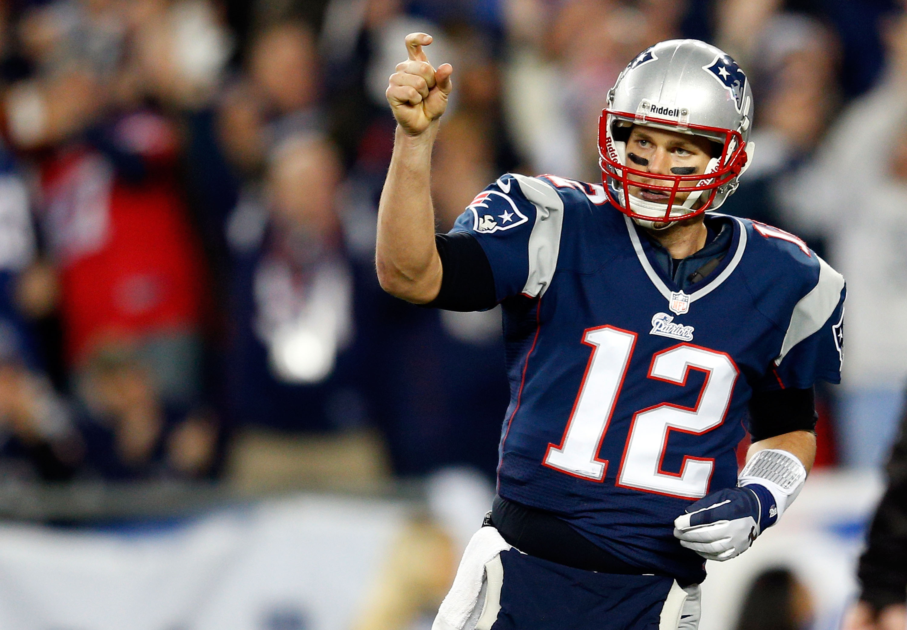 Tom Brady sets NFL playoff wins record as Patriots pummel Texans