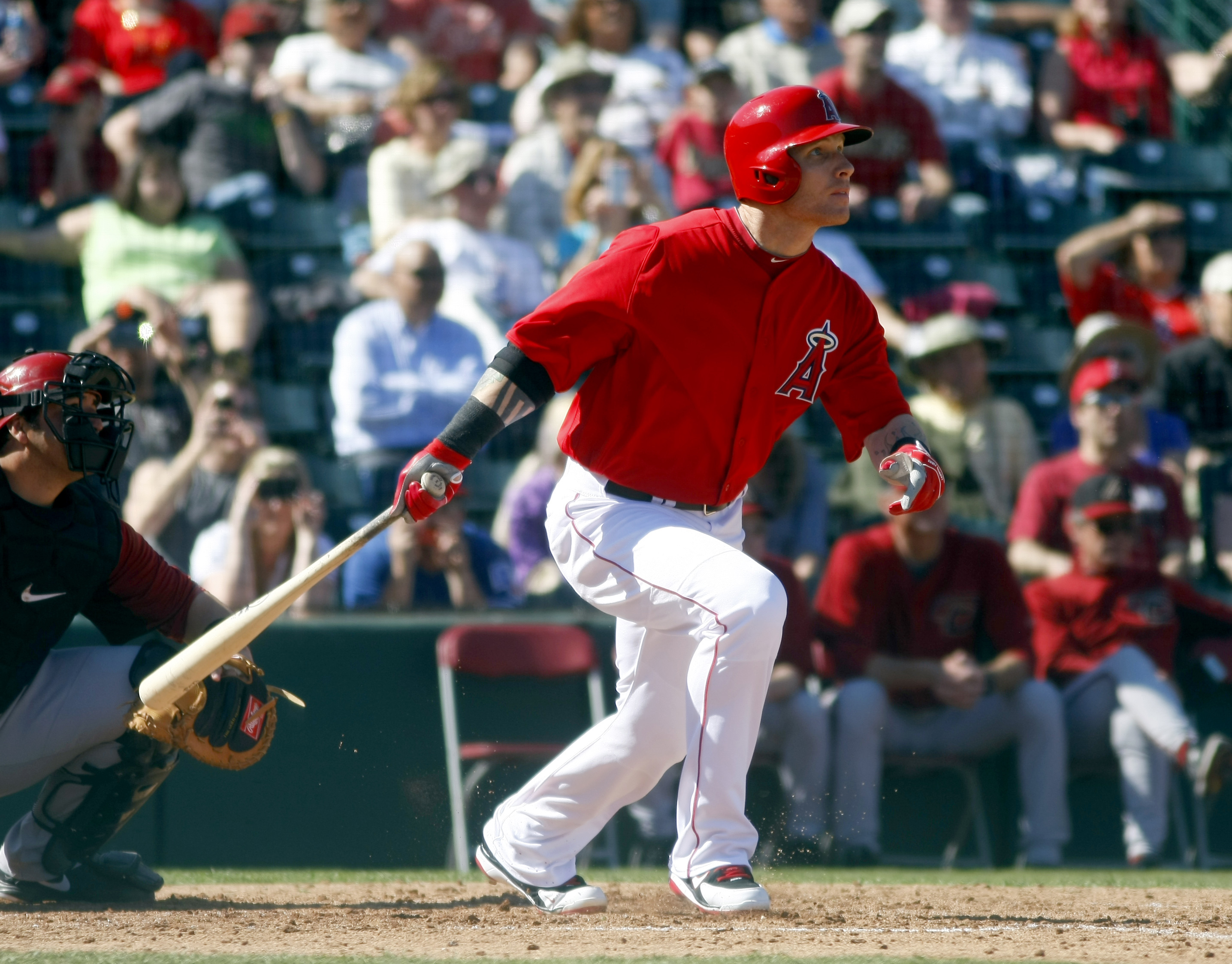 Texas Rangers' Josh Hamilton swings at a pitch in the fifth inning