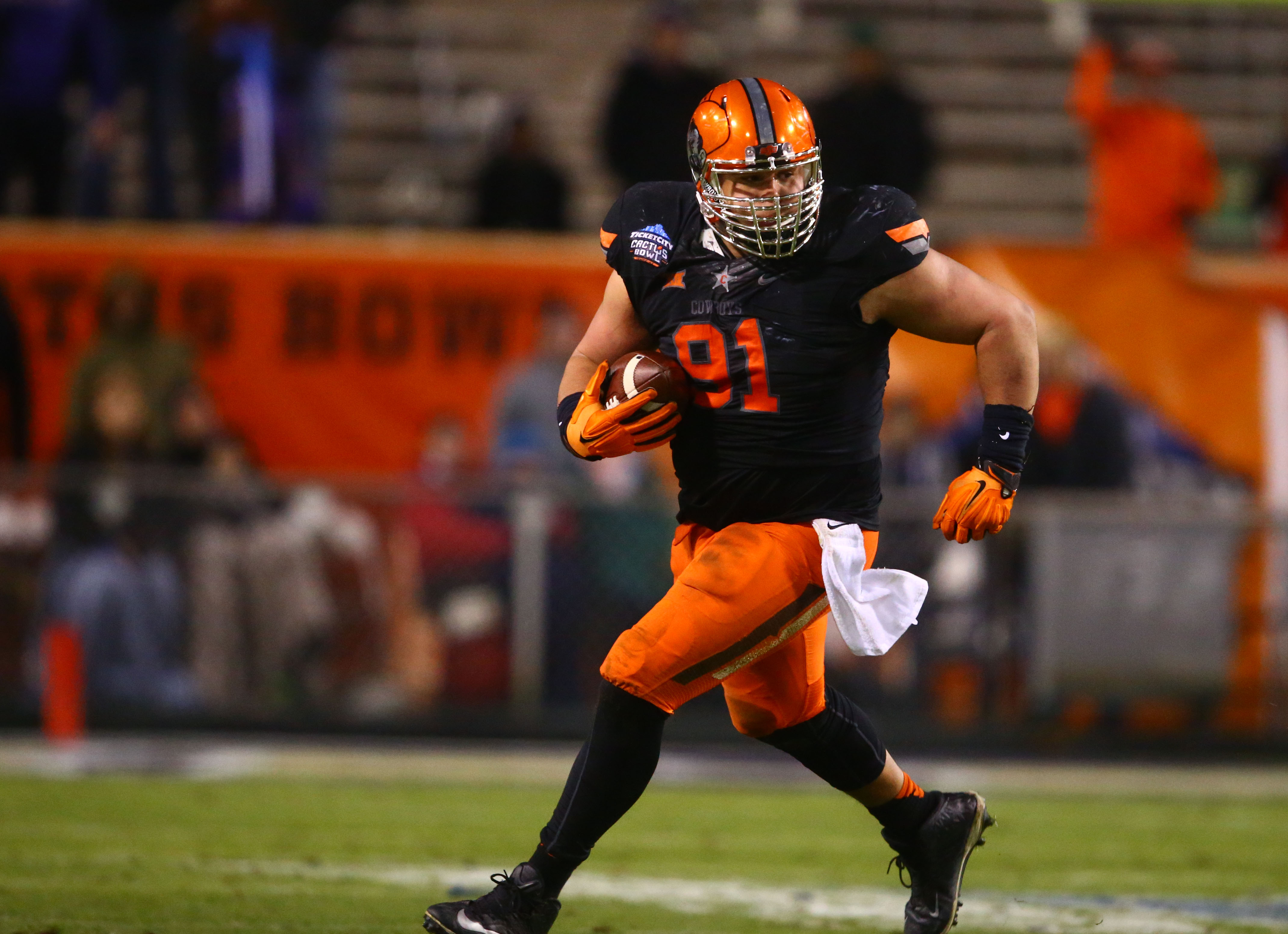Oklahoma State gets offense from defensive tackle in Cactus Bowl victory