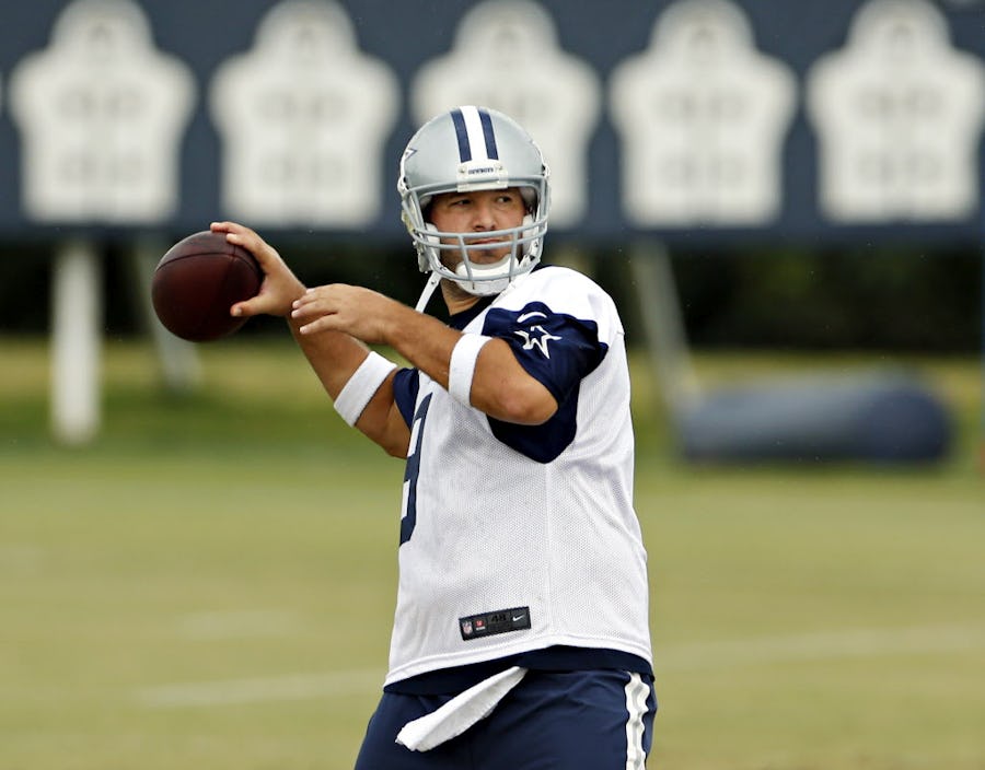 Dallas Cowboys quarterback Tony Romo throws during a mini camp Tuesday, June 16, 2015 at the team's Valley Ranch practice facility in Irving, Texas. (G.J. McCarthy/The Dallas Morning News)