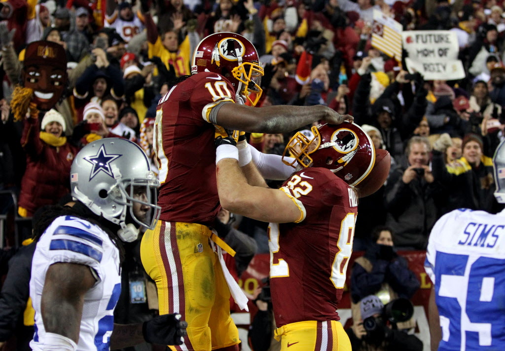 RG3 consoles Tony Romo after Redskins defeat Cowboys 