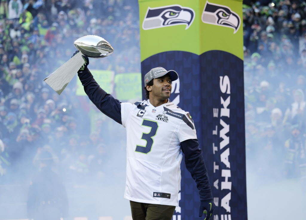Seahawks QB Russell Wilson will attend spring training with the
