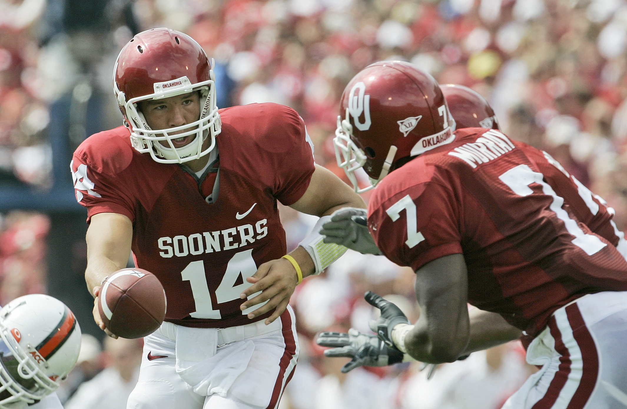 Oklahoma quarterback Sam Bradford (14) leaves the game after an