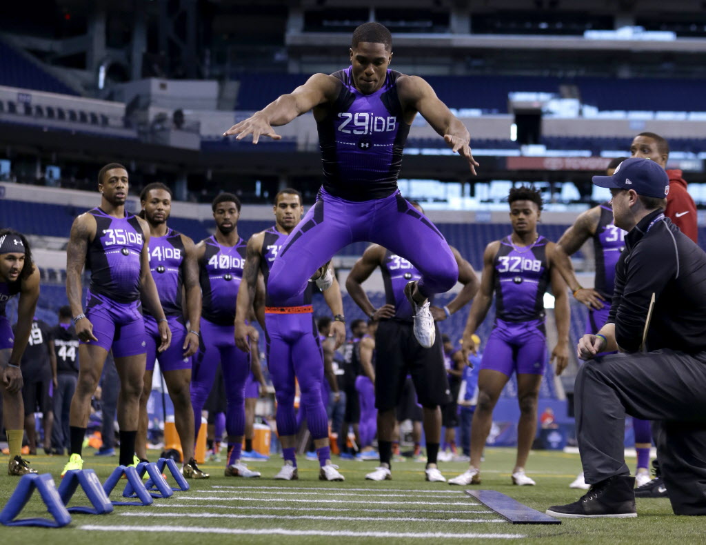 cowboysblog.dallasnews.com_files_2015_04_NFL_COMBINE_FOOTBALL_42434203.jpg