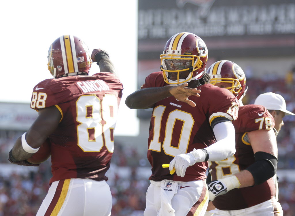 Redskins' rookie Robert Griffin III plays like a veteran in upset