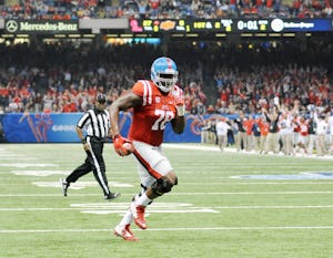 Mississippi offensive lineman Laremy Tunsil (78) runs two yards for a touchdown as time expires in the first half of the Sugar Bowl NCAA college football game against Oklahoma, Friday, Jan. 1, 2016 in New Orleans. (Bruce Newman/The Oxford Eagle via AP) NO SALES; MANDATORY CREDIT