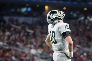 Michigan State quarterback Connor Cook reacts after throwing an incomplete pass during the second half of the Goodyear Cotton Bowl game against Alabama at AT&T Stadium on Thursday, Dec. 31, 2015, in Arlington. (Smiley N. Pool/The Dallas Morning News)