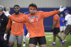 Defensive back Vernon Hargreaves III (1) poses for teammates watching Florida's NFL Pro Day in Gainesville, Fla., Tuesday, March 22, 2016. (AP Photo/Phelan M. Ebenhack)