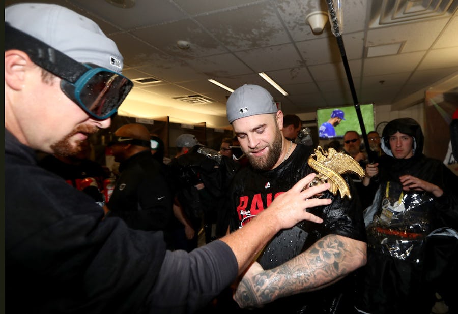 TORONTO, ON - OCTOBER 19:  Mike Napoli #26 of the Cleveland Indians celebrates with his teammates in the locker room after defeating the Toronto Blue Jays with a score of 3 to 0 in game five to win the American League Championship Series at Rogers Centre on October 19, 2016 in Toronto, Canada.  (Photo by Elsa/Getty Images)