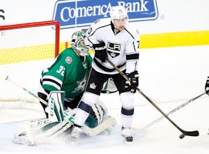 Dallas Stars goalie Kari Lehtonen (32) appears to be hit in the face mask by Kings left wing Tanner Pearson (70) on the game winning shot by Alec Martinez (not pictured) at the American Airlines Center in Dallas, Thursday, October 20, 2016. The Stars lost, 4-3, in overtime. (Tom Fox/The Dallas Morning News)