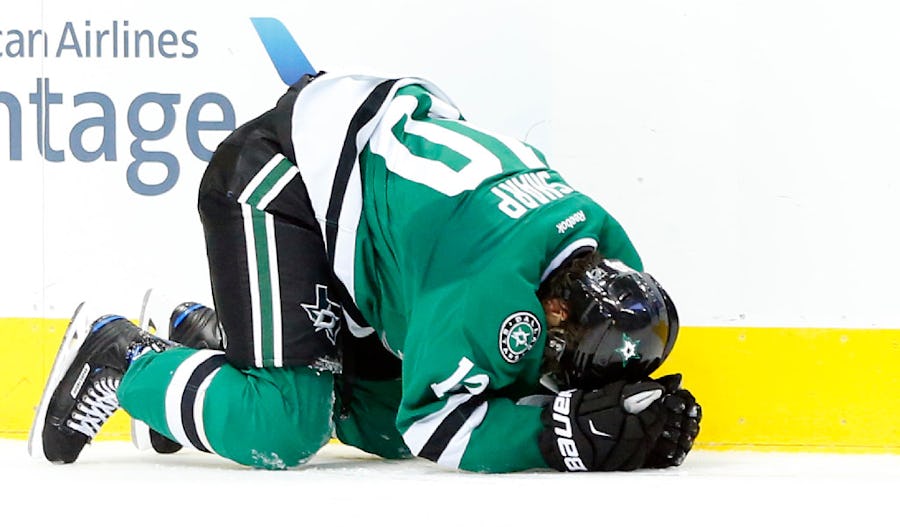 Dallas Stars left wing Patrick Sharp (10) lays on the ice after hitting his head on a check by the Los Angeles Kings in the second period at the American Airlines Center in Dallas, Thursday, October 20, 2016. Sharp left the game with concussion symptoms. (Tom Fox/The Dallas Morning News)