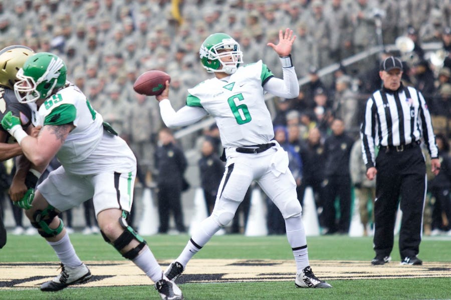 North Texas quarterback Mason Fine throws a touchdown pass in the first quarter of their win against Army at Michie Stadium in West Point, NY. (Josh Conklin/For The Times Herald-Record)