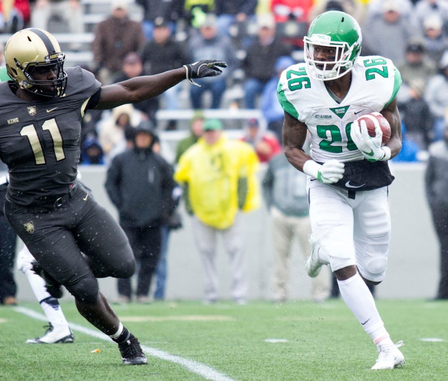 North Texas running back Jeffrey Wilson looks for running room during their win against Army at Michie Stadium in West Point, NY. (Josh Conklin/For The Times Herald-Record)