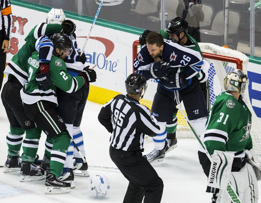 Dallas Stars right wing Patrick Eaves (18) and defenseman Dan Hamhuis (2) fight Winnipeg Jets defenseman Dustin Byfuglien (33) while Dallas Stars left wing Jamie Benn (14) fights Winnipeg Jets right wing Blake Wheeler (26) during the third period of their game on Tuesday, October 25, 2016 at the American Airlines Center in Dallas. (Ashley Landis/The Dallas Morning News)