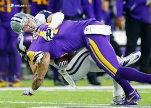 Dallas Cowboys outside linebacker Sean Lee (50) wraps up Minnesota Vikings running back Matt Asiata (44) for a second quarter tackle at U.S. Bank Stadium in Minneapolis, Minnesota, Thursday, December 1, 2016. (Tom Fox/The Dallas Morning News)