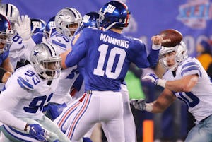 Dallas Cowboys outside linebacker Sean Lee (50) forces a fumble from New York Giants quarterback Eli Manning (10) in the first half during the Dallas Cowboys vs. the New York Giants NFL football game at MetLife Stadium in East Rutherford, New Jersey on Sunday, December 11, 2016. (Louis DeLuca/The Dallas Morning News)