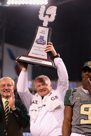 PHOENIX, AZ - DECEMBER 27:  Head coach Jim Grobe of the Baylor Bears celebrates with the trophy following the Motel 6 Cactus Bowl against the Boise State Broncos at Chase Field on December 27, 2016 in Phoenix, Arizona. The Bears defeated the Broncos 31-12.  (Photo by Christian Petersen/Getty Images)