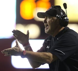 Cedar Hill Longhorns head coach Joey McGuire motivates his offensive squad during the final drive of the game in the last 2 minutes of their game enroute to their 42-41 come from behind victory over Mansfield.   The two Class 6A teams played their non-district football game at Longhorn Stadium in Cedar Hill on September 2, 2016. (Steve Hamm/Special Contributor)