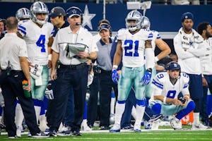 Dallas Cowboys quarterback Tony Romo (9), running back Ezekiel Elliott (21) and quarterback Dak Prescott (4) watch from the sidelines during the first half of an NFC divisional round playoff game at AT&T Stadium against the Green Bay Packers on Sunday, Jan. 15, 2017, in Arlington. (Smiley N. Pool/The Dallas Morning News)