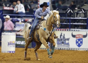 Hailey Kinsel competes in the barrel racing event of The American at AT&T Stadium in Arlington on Sunday, February 19, 2017. (Vernon Bryant/The Dallas Morning News)