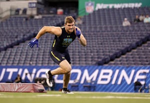 Wisconsin linebacker T.J. Watt runs a drill at the NFL football scouting combine, Sunday, March 5, 2017, in Indianapolis. (AP Photo/David J. Phillip)