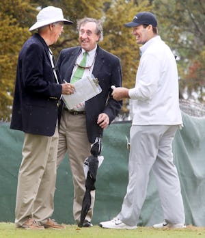 Dallas Cowboys quarterback Tony Romo (right) talks with tournament officials before starting his first round of the Azalea Invitational at the Charleston Country Club Thursday, March 30, 2017. (Brad Nettles/The Post and Courier) 