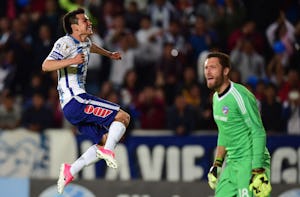 Mexico's Pachuca player Hirving Lozano (L) celebrates his goal against FC Dallas of the US, during their CONCACAF Champions League semifinal football match at the Miguel Hidalgo stadium in Pachuca, Hidalgo State, on April 4, 2017.The match ended 3-1. / AFP PHOTO / RONALDO SCHEMIDTRONALDO SCHEMIDT/AFP/Getty Images