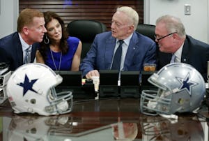 (from left) Dallas Cowboys head coach Jason Garrett, Executive Vice President and Chief Brand Officer Charlotte Jones Anderson, Owner Jerry Jones, and Executive Vice President, CEO, and Director of Player Personnel Stephen Jones visit in the War Room before making their first pick as the NFL Draft gets underway at Valley Ranch Thursday, April 28, 2016. (Tom Fox/The Dallas Morning News)